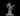 Grey resin digital render of a male lich miniature at 32mm scale — skeletal face with glowing eyes beneath a spiked crown, wide-sleeved ceremonial robes, one clawed hand raised in a casting gesture and the other holding an open spellbook, standing on a flat round base
