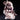 Horned bridge troll crouching aggressively, gripping a fractured timber railing, with curved rune-carved horns and matted fur, on a crumbling stone bridge base. DM Stash sculpt.