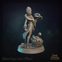 Rear view of reptilian noblewoman miniature in a long coat, holding a snake platter aloft. Detailed upswept hair, barrel of serpents to one side, planked wooden base with rope coils. Sculpt by Great Grimoire.