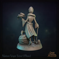 Exploded view of reptilian noblewoman miniature showing three separate components: the figure with cane and snake platter, a barrel of coiled serpents, and a decorative planked wooden base with rope. Sculpt by Great Grimoire.