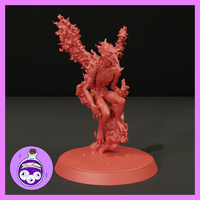 Magma Mephit sculpt rising on a column of flame, arms outstretched, jagged fire-edged wings spread wide, reptilian scaled body, sculpted lava base. By Ella's Arcanum Minis.