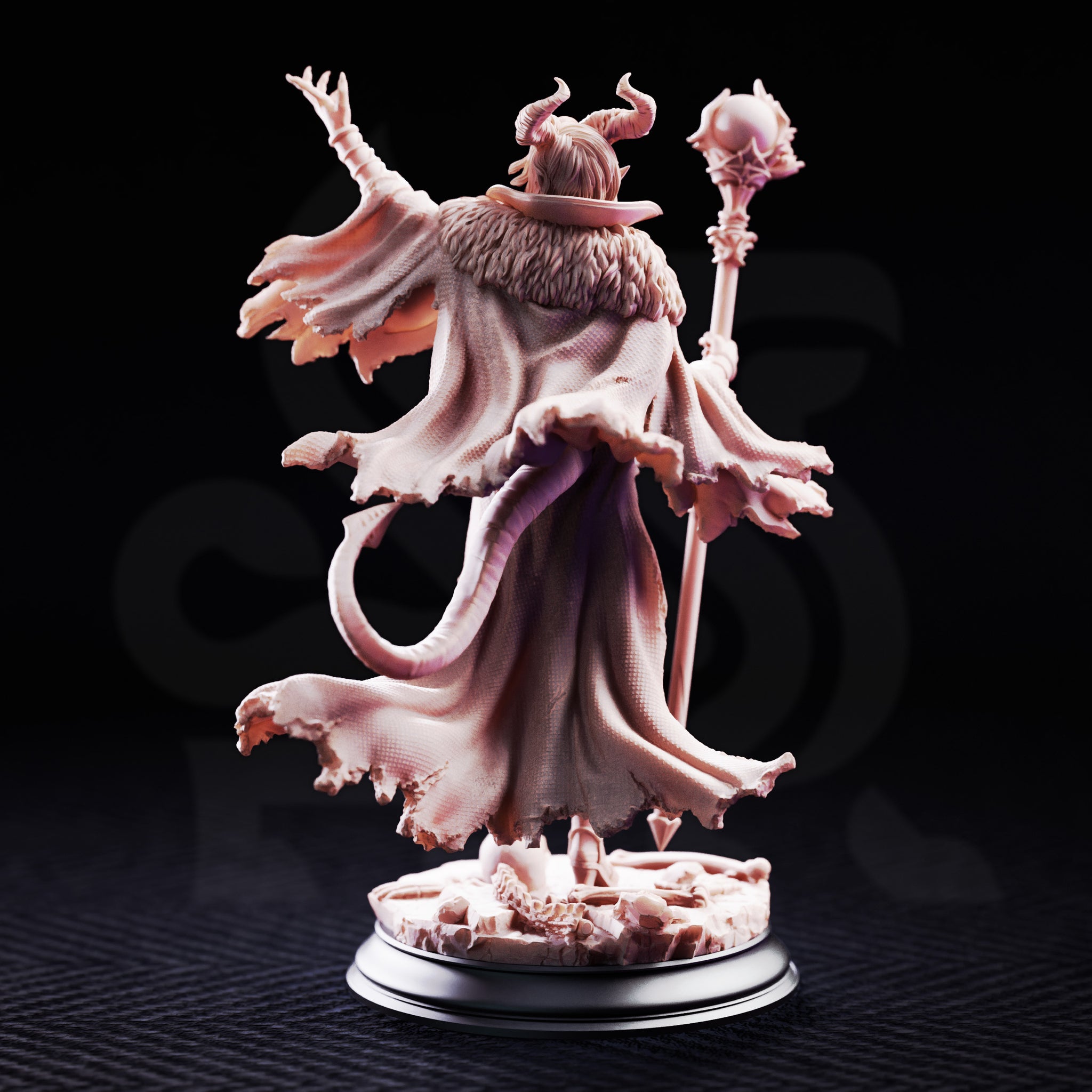 Horned female witch miniature gripping an orb-topped staff in one hand and raising a clawed hand skyward, wearing a tattered cloak with fur trim, standing on a skull-covered base. Sculpt by DM Stash.