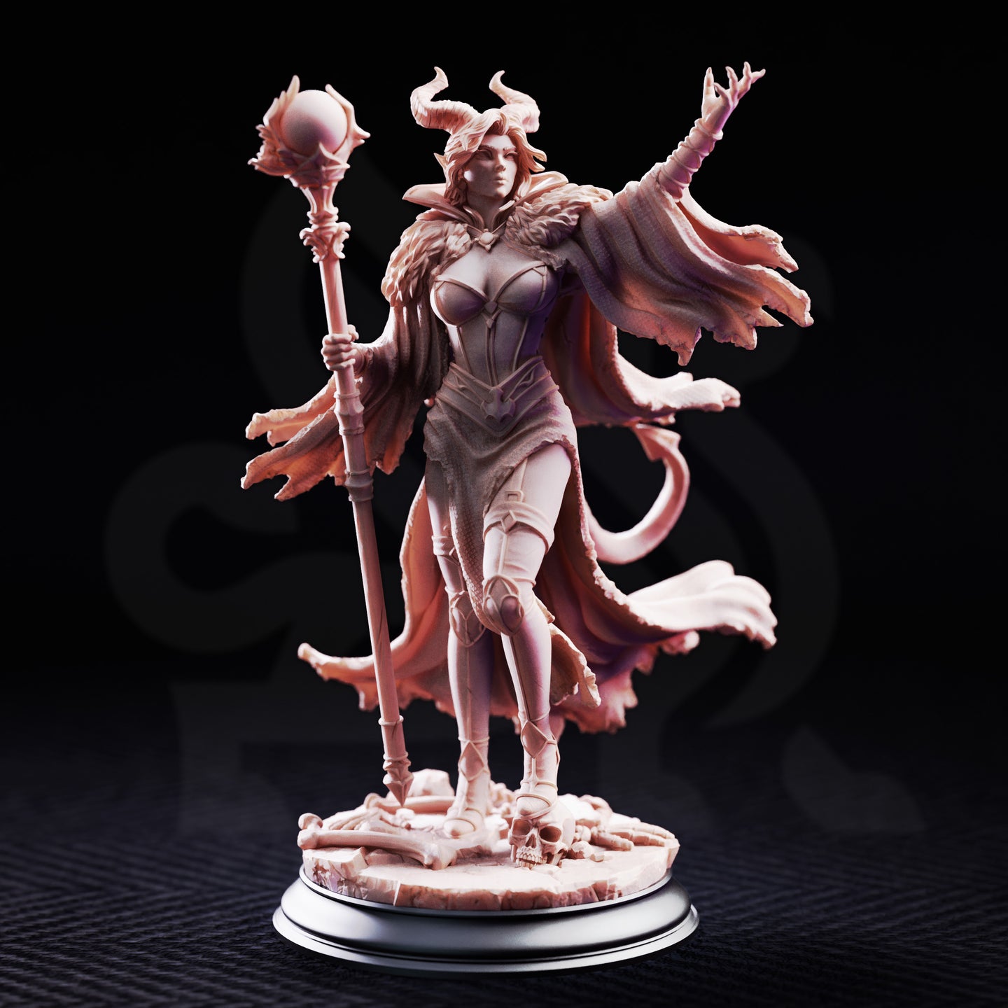 Female horned spellcaster miniature with curled ram-like horns and flowing tattered robes, holding an ornate staff topped with a spiky orb, posed on a bone-strewn base. Sculpt by DM Stash.
