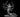 Six-armed female demon with a serpent tail coiled beneath her, each arm raised and wielding a sword fanned outward, snarling face with horns, sculpt by MZ4250.