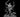 Six-armed serpentine demon rearing upright, each hand gripping a curved blade, scaled muscular torso, coiled serpent lower body, snarling face with spined crest. Sculpt by MZ4250.