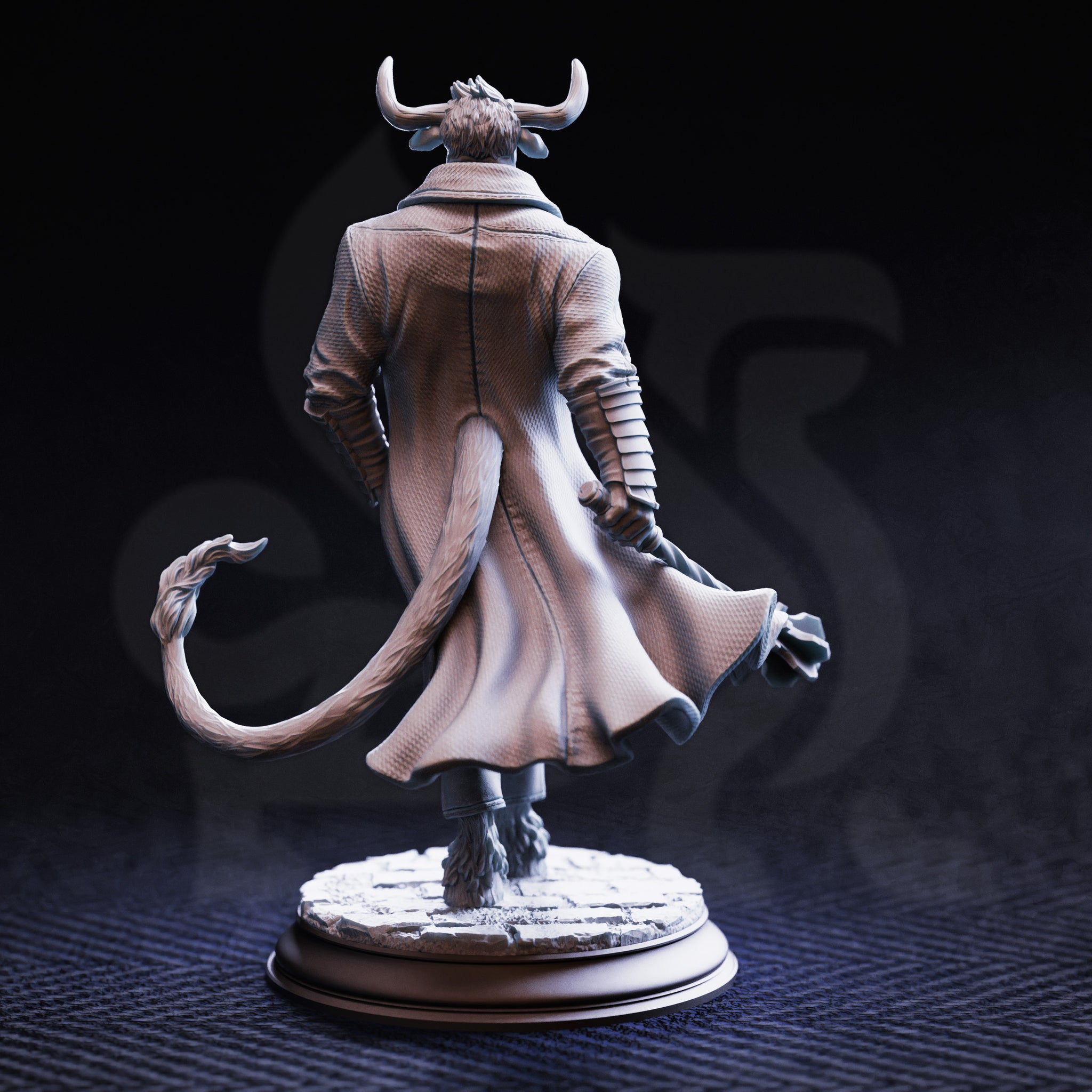 Rear-view photograph of the Marchese di Houf unpainted grey resin miniature. The back of the long overcoat is richly detailed with stitched seams and flowing fabric. The tail sweeps out from beneath the coat hem. The ribbed detailing on the sleeves and the textured cobblestone base are clearly visible from this angle.