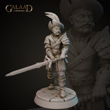 Front view of an unpainted grey resin miniature of a grizzled male mercenary, sculpted by Galaad Miniatures. He wears a feathered tricorne hat, slashed doublet, and partial plate armour with shoulder pauldrons. He holds a long sword lowered at his side in a ready stance. Mounted on a cobblestone round base. 32mm scale.