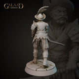 Rear view of the same unpainted grey resin mercenary miniature by Galaad Miniatures, showing the feathered tricorne hat from behind, riveted pauldron on the right shoulder, layered fabric tassets at the waist, and the long sword visible at his side. Cobblestone round base. 32mm scale.