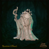 Rear view of the Mossfather miniature — an unpainted grey resin digital render showing the back of the figure's dramatic layered cloak, rendered with a distinctive bark-like wave pattern. Antler-like protrusions and mushroom caps rise from his hood. The curling top of his runic staff is visible raised above his right shoulder. Dark forest background.