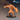 Savage troll miniature mid-punch, arms flung wide with gnarled clawed hands, jaw wrenched open in a roar, warty muscular body with a shaggy hide kilt, by Epic Miniatures.