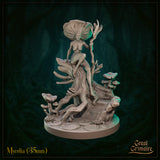 Front view of Mycelia 35mm resin miniature by Great Grimoire — an unpainted fungal fey figure with a broad mushroom cap head, seated on a gnarled tree stump and holding a twisted branch staff, surrounded by mushroom clusters and lily pads on a detailed scenic base