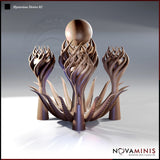 Digital render of Mysterious Device 02 by Novaminis — a tall alien construct of three coiling columns rising from a base of serrated tentacles, the central pillar crowned with a large smooth sphere cradled in spiralling fronds, flanked by two smaller matching columns, all in warm brown resin tones against a grey studio background