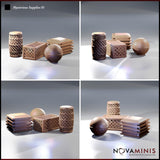 Four-panel digital render showing the Novaminis Mysterious Supplies 01 scatter terrain set from multiple angles — front-left, front-right, low rear, and low front — highlighting the open lattice weave detail on the barrel and crate, the layered profile of the stacked trays, and the rounded studs on the orb vessel.