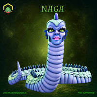 Naga miniature by The Toadstool Weaver: a humanoid face with yellow-green eyes, fin-like head flanges, and a single brow horn, rising from a coiled scaled serpent body with a spined dorsal ridge.