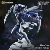 Rear-facing drow rogue in dynamic running pose, one blade raised overhead, scaled cloak spread wide behind her, armoured greaves and loincloth visible. Detailed rocky base. Sculpt by DM Stash.