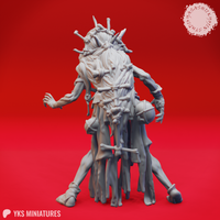 Rear three-quarter view digital render of the unpainted grey Night Hag miniature, clearly showing the dense crown of bones, sticks, and fetishes covering the back of her head, multiple bound bone charms across her torso, and the full mass of entangled limbs and partial figures forming her lower body.