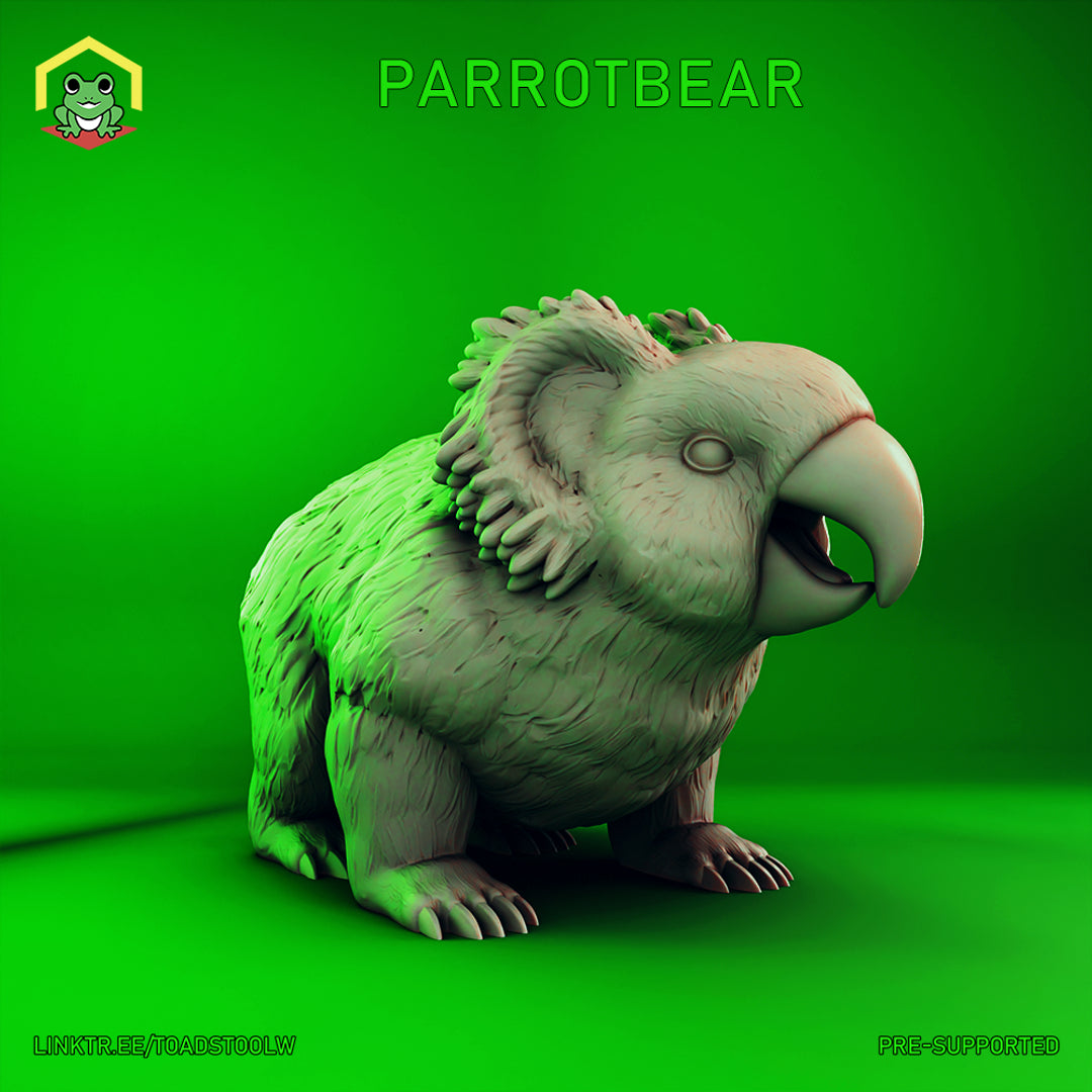 Digital render of the Parrotbear miniature — an unpainted grey resin sculpt showing a stocky bear-bodied creature with a hooked parrot beak, round feathered face, layered feather mane along the spine, and four broad clawed paws, viewed from a three-quarter front angle against a green background
