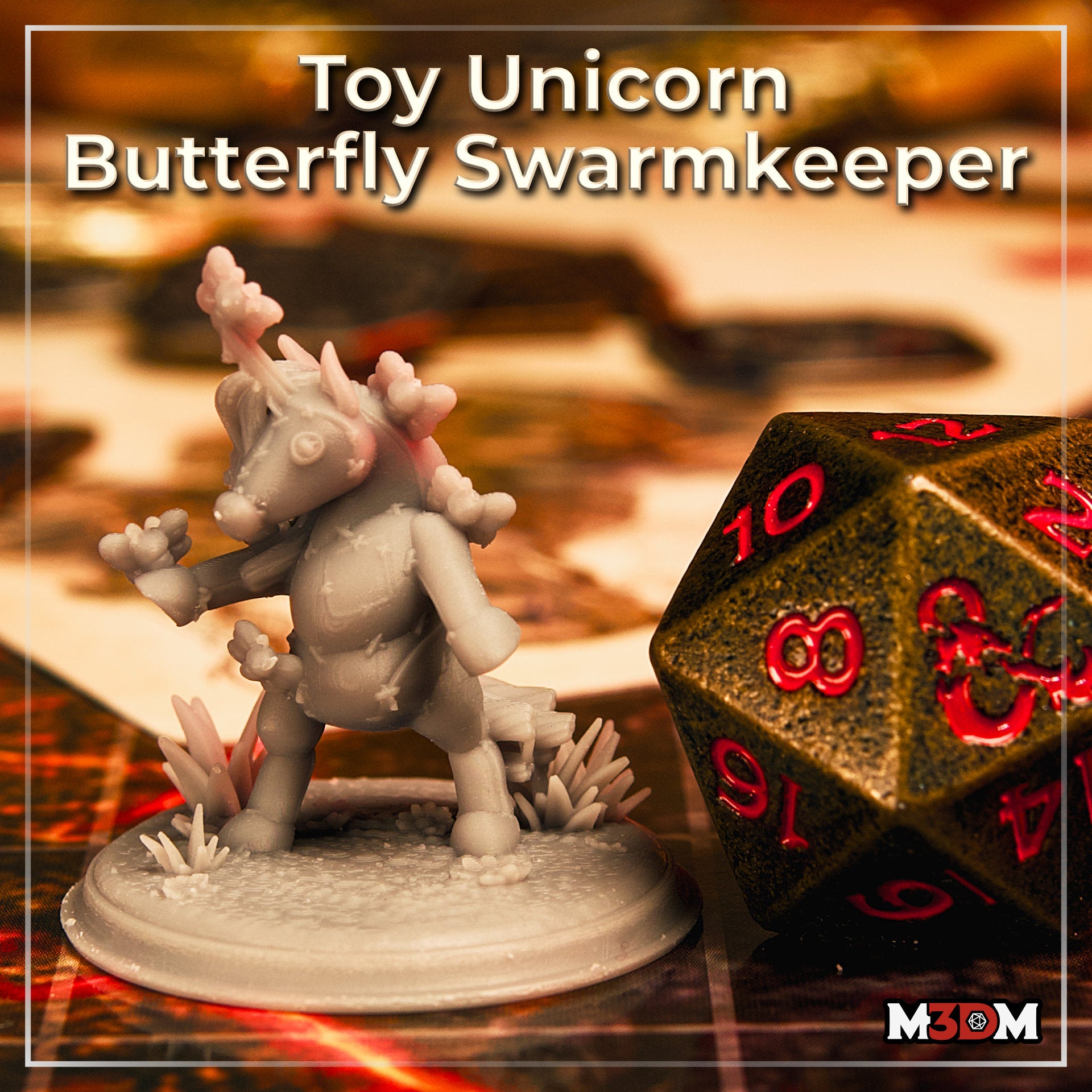 Photograph of an unpainted grey resin Toy Unicorn Butterfly Swarmkeeper miniature on a gaming table beside a large black and red d20 — rearing unicorn with stitched seams, butterfly clusters, and a detailed scenic base