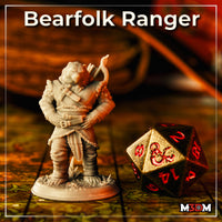 Unpainted grey resin Bearfolk Ranger miniature photographed on a D&D game tile next to a large red and gold D20 die, showing the bow-carrying bear-folk figure in full detail at 32mm scale