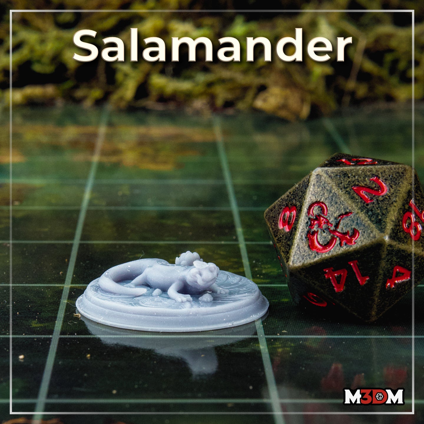 Printed and unpainted resin Salamander miniature on a gaming mat next to a large D20 die, showing the actual print scale — the small chibi salamander rests on its detailed lily pad base with lily buds sculpted around it