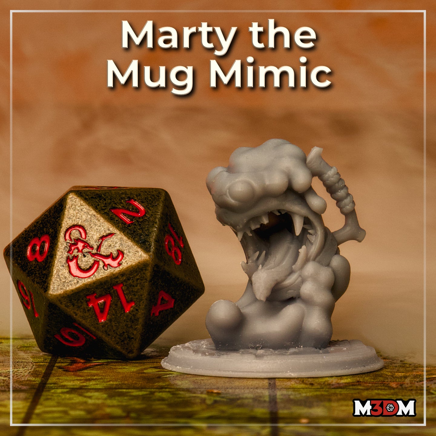 Photograph of the printed Marty the Mug Mimic miniature in unpainted grey resin, posed beside a D&D d20 die for scale — showing the open-mouthed roaring expression, rope-handled mug, and lumpy amorphous body on a plain round base