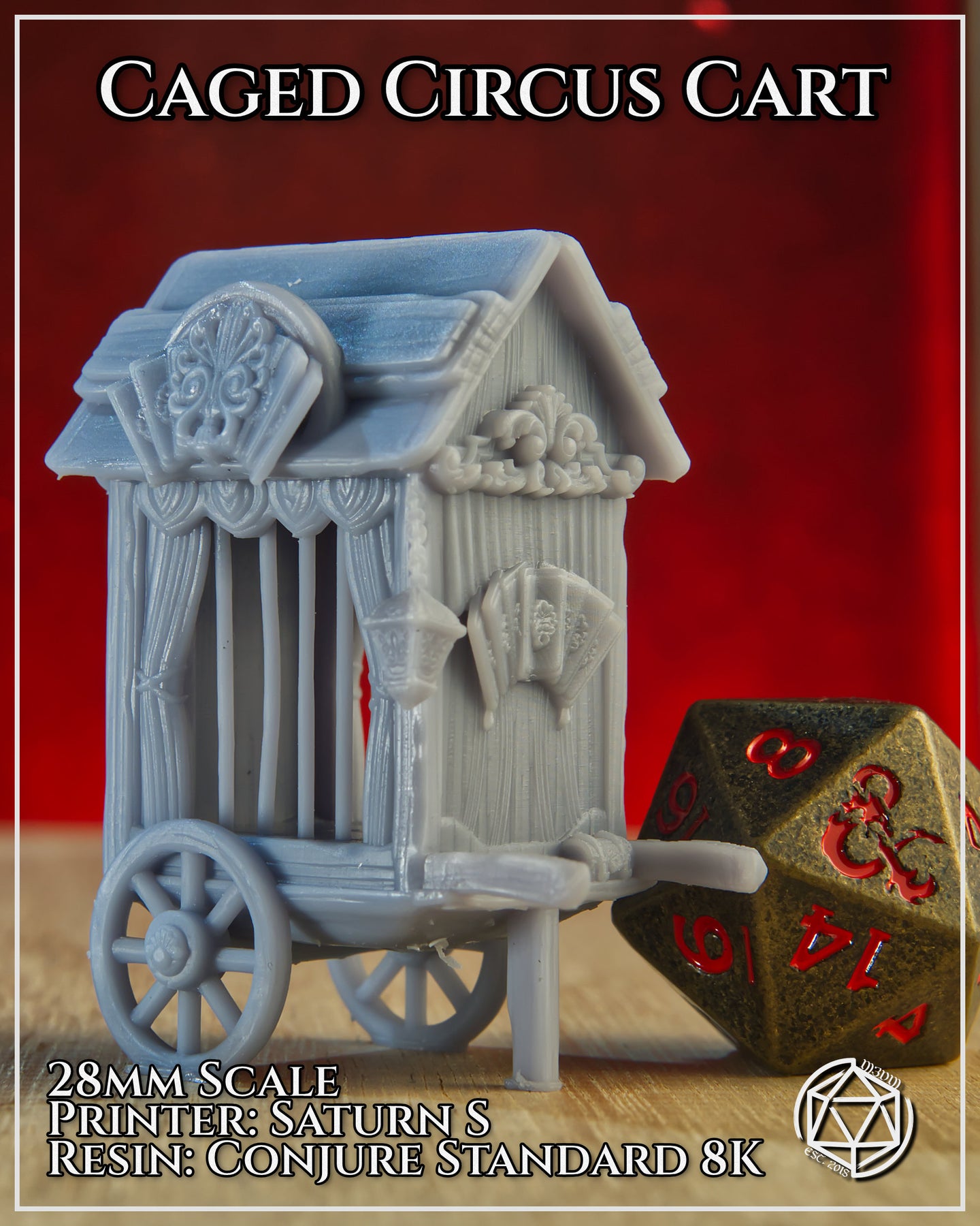 Photograph of the printed Caged Circus Cart terrain piece in unpainted grey resin, shown at 28mm scale alongside a large bronze D20 die for size reference, displaying the carved decorative facade, curtained cage bars, and wheeled base with draw-shaft