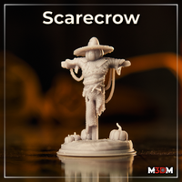 Wicker-bodied scarecrow miniature with pumpkin head and wide straw hat, arms spread on a wooden crossbeam, fraying rope tails hanging at its sides, small pumpkins clustered around the base. Sculpt by Mia Kay M3DM.