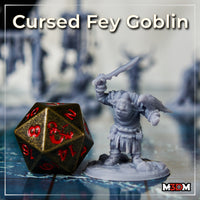 Rear view of the same goblin sculpt, sword raised high, raven visible across the shoulders, wearing layered rope-trimmed robes, standing on a rubble-strewn scenic base. Sculpt by Mia Kay M3DM.
