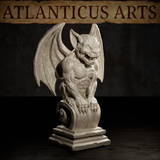 Gargoyle miniature by Atlanticus Arts viewed from slightly below, revealing lean ribbed musculature, large pointed ears, and detailed bat-wing membrane, mounted on a tiered stepped base.