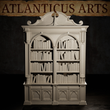 Gothic two-section bookcase showing packed shelves with books of differing heights — some upright, some leaning — beneath pointed arches, with decorative pilasters and a gothic panelled lower cabinet. Sculpt by Atlanticus Arts.