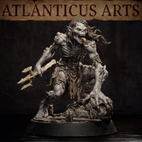 Lacedon Ghoul by Atlanticus Arts: gaunt undead figure with exposed ribcage and tattered cloth, clawed hand low, skull-like face snarling wide, posed over a base of fractured ground and scattered bones.