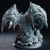 Quorenderi by DM Stash seen from the front — towering tentacled body with hollow eye clusters covering its flanks, curling tentacles cascading from a central face, broad horns and spines throughout, with a detailed lighthouse base below.