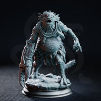 Fish-headed aberration with spined crest and open jaws, one arm a serrated crab claw, the other reaching with hooked claws, rope coiled at neck, standing on a cracked stone scenic base. Sculpt by DM Stash.