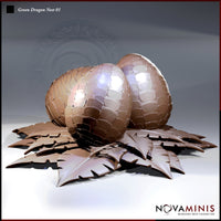 Digital render of the Green Dragon Nest 01 terrain piece by Novaminis — two large scaled dragon eggs resting in a broad nest of overlapping serrated leaves, shown in unpainted brown resin tones with a glossy sheen on the eggs