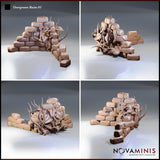 Four-angle digital render of Overgrown Ruins 01 terrain piece — front view showing vines and flower detail, side view revealing a skeletal form half-buried in the rubble, rear view with branching growth, and three-quarter view showing the full stone mound layout, all in unpainted clay render