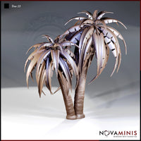 Digital render of two Novaminis palm tree scatter terrain variants — a twin-trunked palm cluster and a single-trunked palm — showing detailed segmented fronds and textured bark, displayed against a neutral grey background, unpainted resin render in warm brown and purple tones