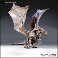 Ancient Red Dragon miniature by Novaminis, rearing upright with enormous wings spread wide, jaws open in a roar, heavy taloned forelegs braced, spine-ridged back covered in sharp spines.
