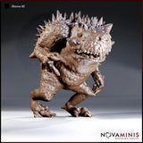 Hezrou demon miniature by Novaminis — squat, warty toad-like body mid-lunge, one foot raised, claws splayed forward, wide jaw open showing rows of jagged teeth, dense spines across head and shoulders.