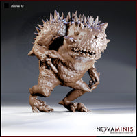 Hezrou demon miniature by Novaminis — squat, warty toad-like body mid-lunge, one foot raised, claws splayed forward, wide jaw open showing rows of jagged teeth, dense spines across head and shoulders.