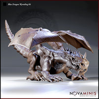 Blue Dragon Wyrmling 04 by Novaminis — small dragon crouching low with wings half-spread, head thrust forward, jaws open showing serrated fangs, single spiralling horn, heavy scale texture across chest and flanks.
