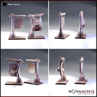 Six angles of the two mimic sign sculpts — the dormant version shows smooth wood-grain board hanging from chains on a timber frame; the revealed version exposes warty hide, a bulging eye, and a wide open jaw full of uneven teeth. Sculpts by Novaminis.