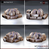 Four-panel render showing a dragon egg nest terrain piece from multiple directions — three scaled eggs surrounded by chunky weathered stone blocks. Sculpt by Novaminis.