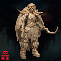 Angled front-left digital render of Ravisin the Frost Druid — unpainted sculpt highlighting the swept cloak, bone ornaments woven through flowing hair, curved sickle blade extended in her left hand, and the layered wrap detailing across her torso and waist