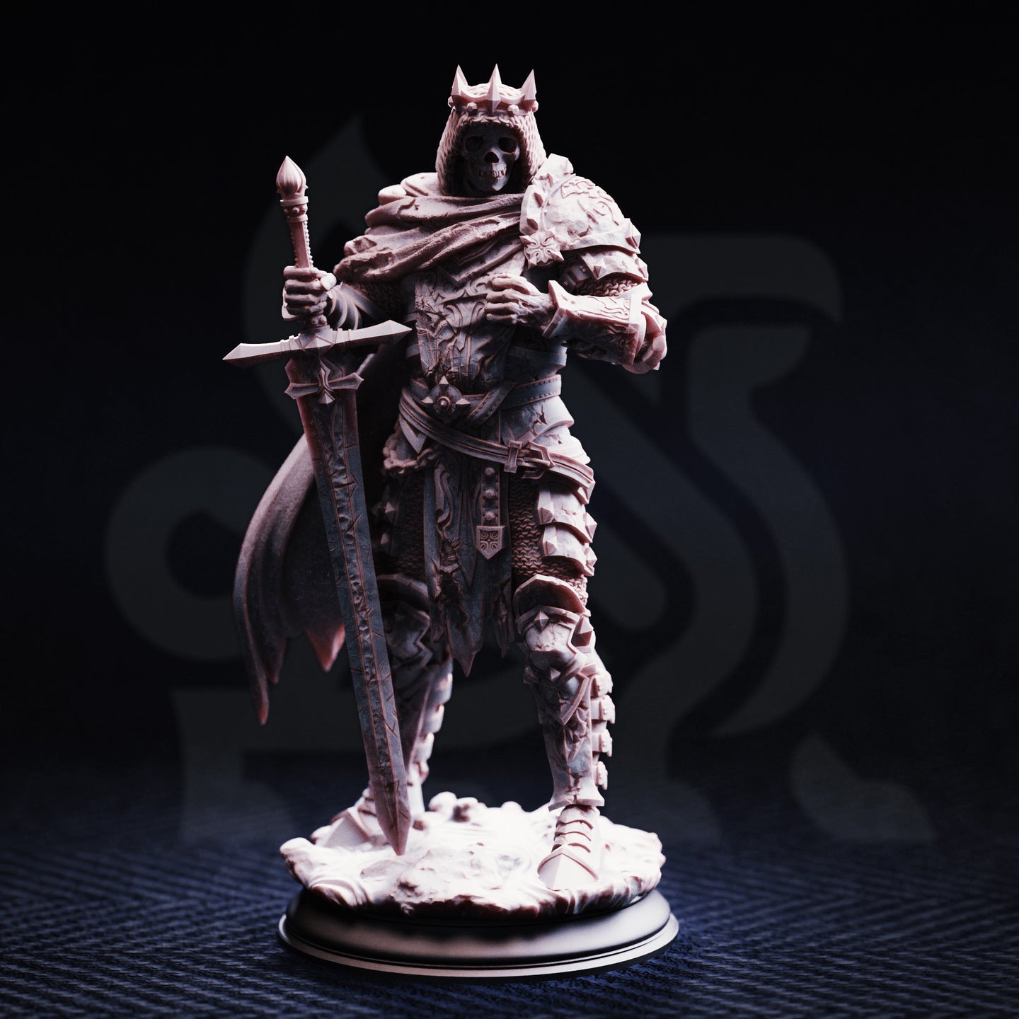 Unpainted grey resin miniature of Ridan the Everlasting — front view showing the crowned skull face, ornate armour detailing, large greatsword, and layered cloak. Photographed on a dark background with a round display base.