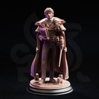 Robin Presner Student of Conjuration 32mm resin miniature by DM Stash — front view of an unpainted grey resin figure standing in a composed pose, holding a spellbook to his chest and a wand at his side, mounted on a scenic base with melted candle stubs