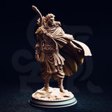 Front-facing studio photograph of the unpainted Sactarin Sun Elf Tracker miniature at 32mm scale, showing detailed fabric draping, feather-adorned hair, elven armour detailing, and the carved longbow slung over his shoulder.