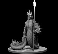Fire salamander miniature with a serpentine coiled tail wreathed in sculpted flames, holding a tall spear with a burning tip, crowned with sharp cranial spines and hanging facial tendrils. Sculpt by MZ4250.