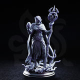 Saratha the Watchful by DM Stash — tall drow priestess holding a twisted trident-topped staff and raising an orb in her other hand, wearing a fur-collared cloak over layered cloth wrappings, standing on a tangled root base.