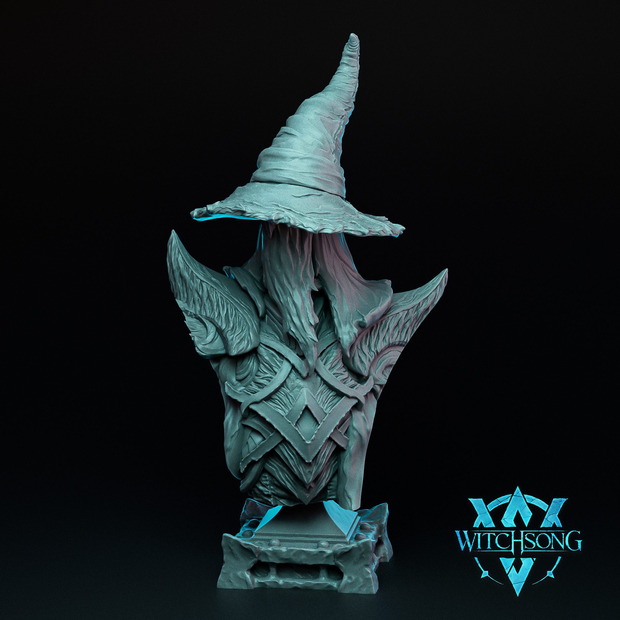 Unpainted grey resin bust of The Scholar by Witchsong Miniatures — a robed arcane figure wearing a tall tattered witch's hat that obscures the face entirely with hanging cloth tendrils, mounted on a sculpted plinth base with rune-carved armour and wing-like shoulder details visible