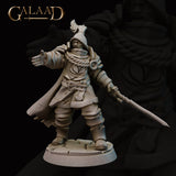 Front view of an unpainted grey resin Queen's Guard Sergeant miniature at 32mm scale — male figure in layered plate armour with rope-bound pauldrons and a plumed helmet, standing wide-legged on a cracked cobblestone base, right arm outstretched with open hand, left arm extending a longsword at low guard, cape sweeping behind him, mouth open as if issuing a command
